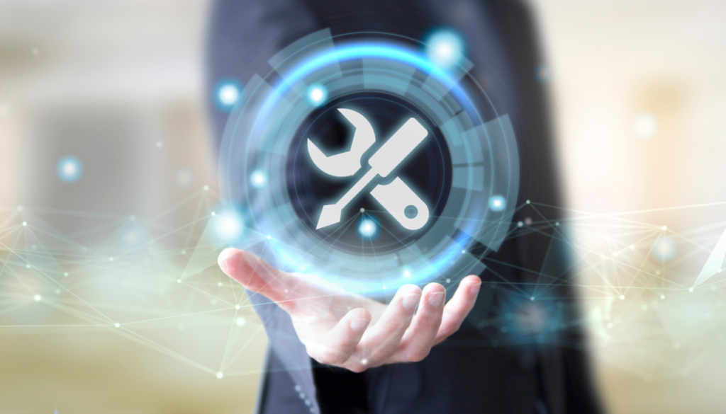 Soluções Técnicas e Digitais Mão segurando ícone de ferramentas flutuando, representando suporte técnico e soluções digitais.